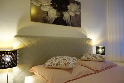 Ein Bett oder Betten in einem Zimmer der Unterkunft Nettes, gemütliches Apartment