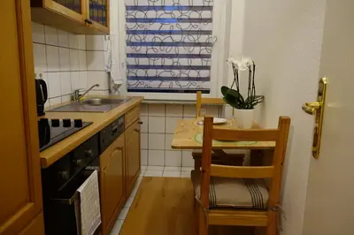 Küche/Küchenzeile in der Unterkunft Nettes, gemütliches Apartment