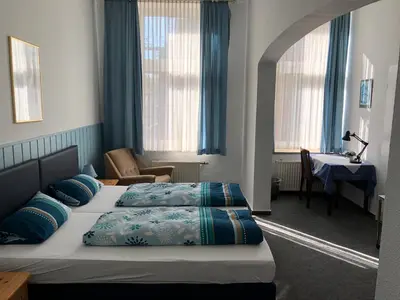 Ein Bett oder Betten in einem Zimmer der Unterkunft Hotel Westfälischer Hof