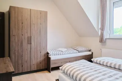 Ein Bett oder Betten in einem Zimmer der Unterkunft Beisenbusch Hotel & Restaurant