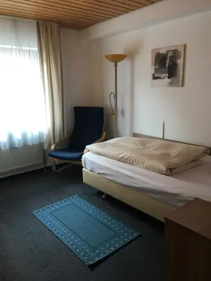 Ein Bett oder Betten in einem Zimmer der Unterkunft Gasthof zur Post Hotel - Restaurant