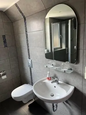 Ein Badezimmer in der Unterkunft Gasthof zur Post Hotel - Restaurant