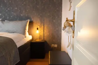 Ein Bett oder Betten in einem Zimmer der Unterkunft Ferienwohnung Menden