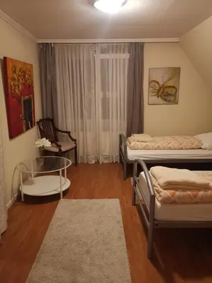Ein Bett oder Betten in einem Zimmer der Unterkunft Düsseldorf Messe -Apartment Milan