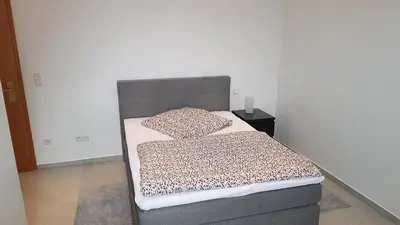 Ein Bett oder Betten in einem Zimmer der Unterkunft Zimmervermietung Mülheim