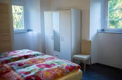 Ein Bett oder Betten in einem Zimmer der Unterkunft Quadenhof