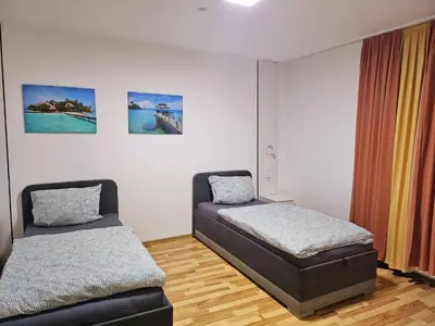 Ein Bett oder Betten in einem Zimmer der Unterkunft Pension an der Zeche