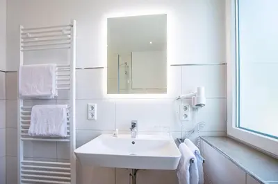 Ein Badezimmer in der Unterkunft Landgasthof-Hotel Zum Steverstrand