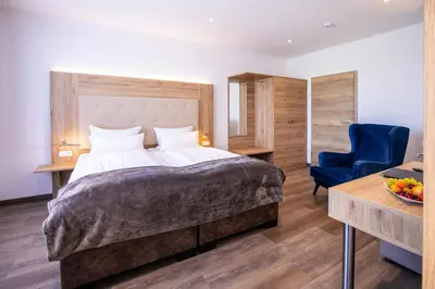 Ein Bett oder Betten in einem Zimmer der Unterkunft Landgasthof-Hotel Zum Steverstrand