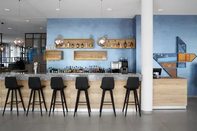 Ein Restaurant oder anderes Speiselokal in der Unterkunft Four Points Flex by Sheraton Bochum