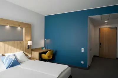 Ein Bett oder Betten in einem Zimmer der Unterkunft Four Points Flex by Sheraton Bochum