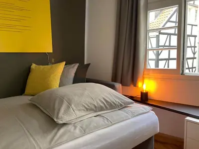 Ein Bett oder Betten in einem Zimmer der Unterkunft Haus am Stadttor