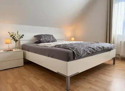 Ein Bett oder Betten in einem Zimmer der Unterkunft Moderne 3 Zimmer Wohnung in Heiligenhaus