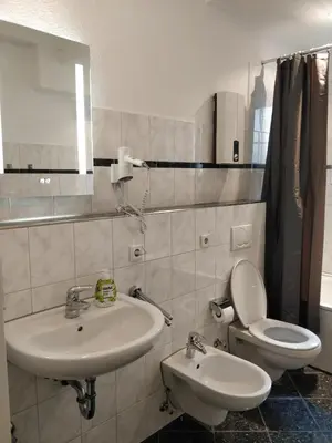 Ein Badezimmer in der Unterkunft Aparthouse Graf-Adolf