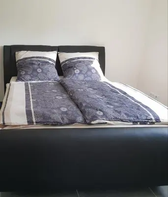 Ein Bett oder Betten in einem Zimmer der Unterkunft Souterrainwohnung im Grünen