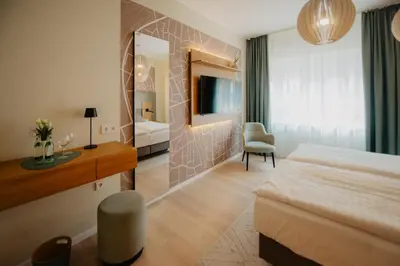 Ein Bett oder Betten in einem Zimmer der Unterkunft Hotel-Restaurant Haselhoff