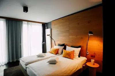 Ein Bett oder Betten in einem Zimmer der Unterkunft Claudius Hotel