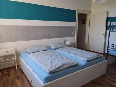 Ein Bett oder Betten in einem Zimmer der Unterkunft Ferienwohnung Harmonie 45 m2