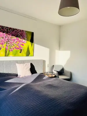 Ein Bett oder Betten in einem Zimmer der Unterkunft Neues, ruhiges Apartment Nordic in Düsseldorf-Nord