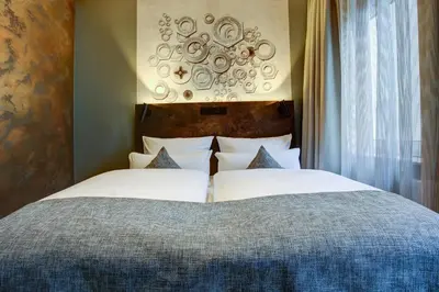 Ein Bett oder Betten in einem Zimmer der Unterkunft Boutique Essen City