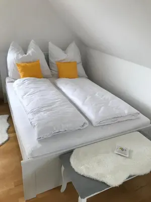 Ein Bett oder Betten in einem Zimmer der Unterkunft Kleine Auszeit mit Aussicht Velbert Tönisheide