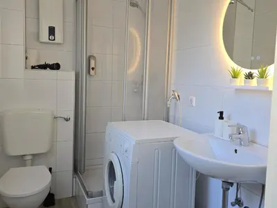 Ein Badezimmer in der Unterkunft Rhein Living Business Apartment