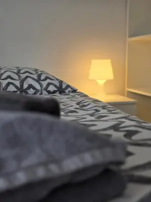 Ein Bett oder Betten in einem Zimmer der Unterkunft Rhein Living Business Apartment