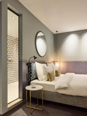 Ein Bett oder Betten in einem Zimmer der Unterkunft Postboutique Hotel Wuppertal
