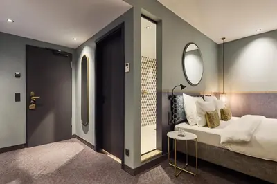 Ein Bett oder Betten in einem Zimmer der Unterkunft Postboutique Hotel Wuppertal