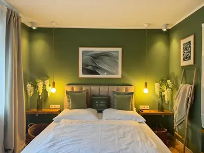 Ein Bett oder Betten in einem Zimmer der Unterkunft Nettes Appartment in Düsseldorf-Derendorf - stylisch + gemütlich