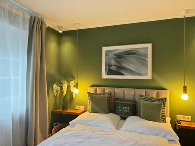 Ein Bett oder Betten in einem Zimmer der Unterkunft Nettes Appartment in Düsseldorf-Derendorf - stylisch + gemütlich