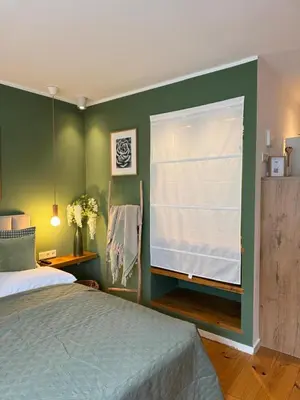 Ein Bett oder Betten in einem Zimmer der Unterkunft Nettes Appartment in Düsseldorf-Derendorf - stylisch + gemütlich