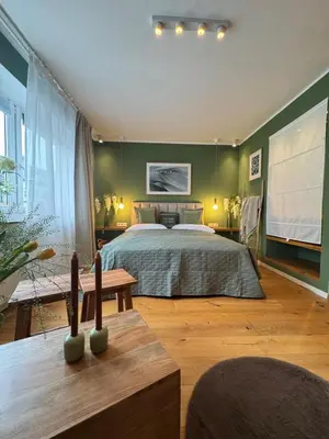 Ein Bett oder Betten in einem Zimmer der Unterkunft Nettes Appartment in Düsseldorf-Derendorf - stylisch + gemütlich