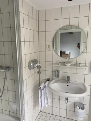 Ein Badezimmer in der Unterkunft Hotel & Gastropark Loemühle