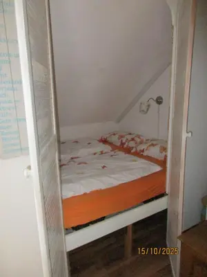 Ein Bett oder Betten in einem Zimmer der Unterkunft Ferienwohnung,Über Tage