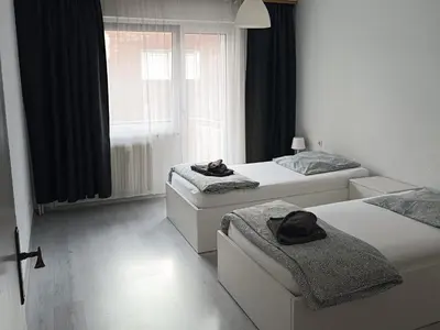 Ein Bett oder Betten in einem Zimmer der Unterkunft Rhein Living Apartment - Balkon und Rheinpromenade