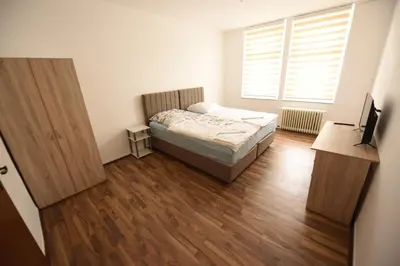 Ein Bett oder Betten in einem Zimmer der Unterkunft Design Apartments 2