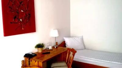 Ein Sitzbereich in der Unterkunft Hotel am Stadion
