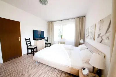 Ein Bett oder Betten in einem Zimmer der Unterkunft Hotel am Stadion