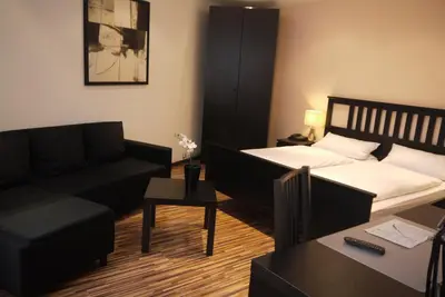 Ein Bett oder Betten in einem Zimmer der Unterkunft Hotel am Stadion