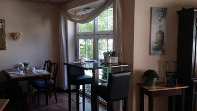 Ein Sitzbereich in der Unterkunft Hotel am Stadion