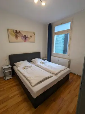 Ein Bett oder Betten in einem Zimmer der Unterkunft Cityhouse - Wiesen