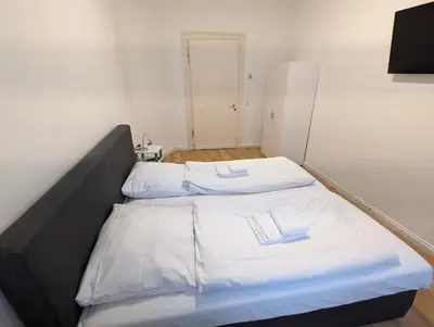 Ein Bett oder Betten in einem Zimmer der Unterkunft Cityhouse - Wiesen
