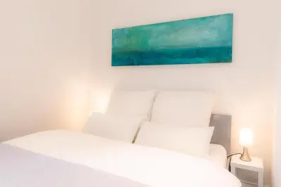 Ein Bett oder Betten in einem Zimmer der Unterkunft Apartment 229