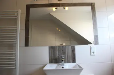 Ein Badezimmer in der Unterkunft Stadthaus Edel - Apartment Binz