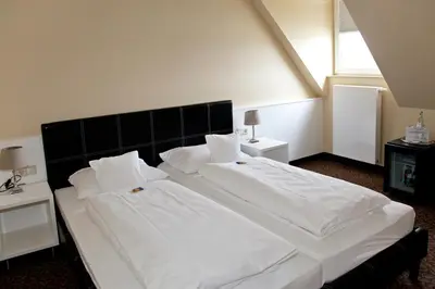 Ein Bett oder Betten in einem Zimmer der Unterkunft Schnellenburg