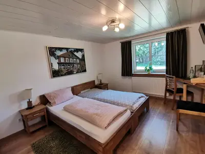 Ein Bett oder Betten in einem Zimmer der Unterkunft Bleckmanns Hof