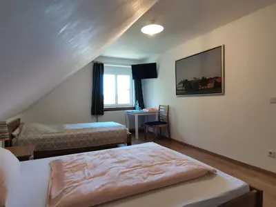 Ein Bett oder Betten in einem Zimmer der Unterkunft Bleckmanns Hof