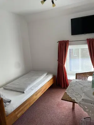 Ein Bett oder Betten in einem Zimmer der Unterkunft Bleckmanns Hof