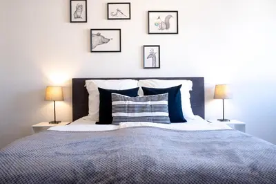 Ein Bett oder Betten in einem Zimmer der Unterkunft Zentral mit Stellplatz Messe und Uni